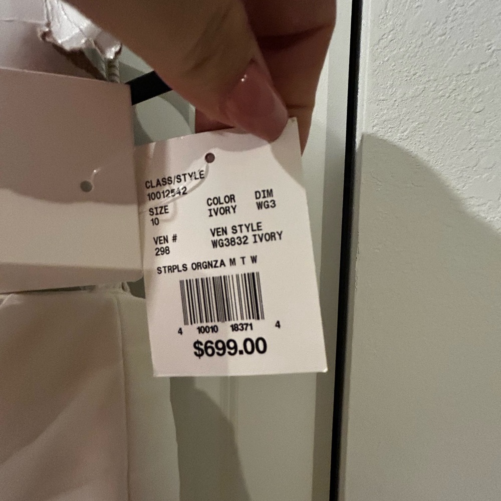 David’s Bridal NEW
Wedding dress -includes everything in picture (veil, crown) - Picture 12 of 15